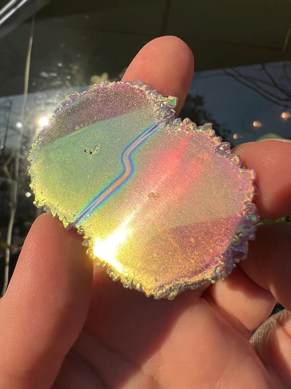 Rainbow aura amethyst stalactite slice, eye