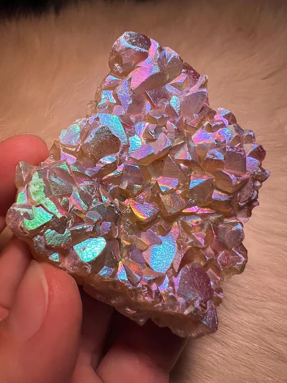 Shifty rainbow aura calcite cluster