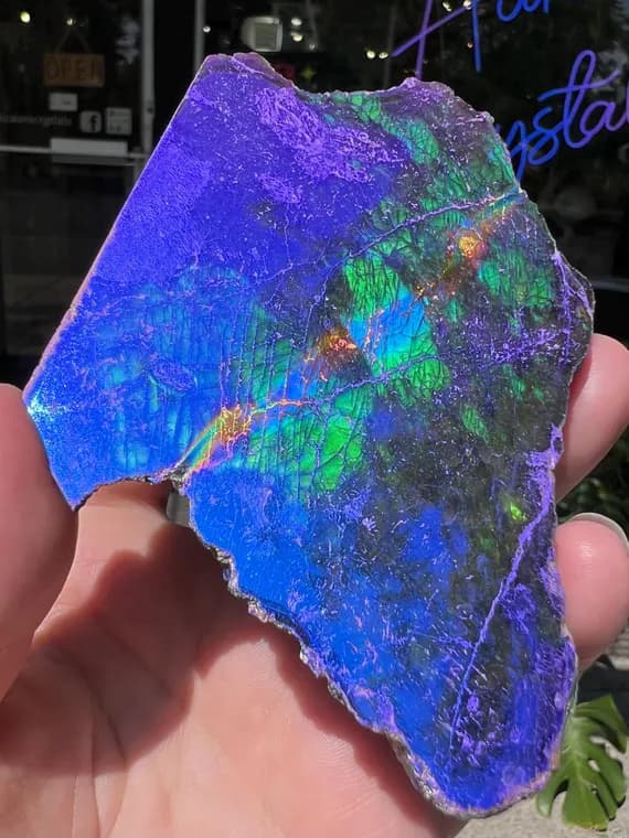 Moonbeam aura labradorite semi polished specimen, half polished